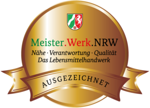 Goldenes Meister.Werk.NRW Siegel mit dem NRW-Wappen.